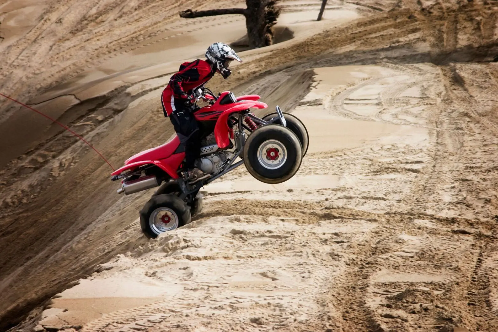 Quad rider - Outdoor action shot in landscape format of young man